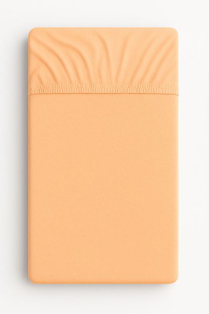 Prześcieradło frotte z gumką do łóżeczka 120x60cm - brzoskwiniowe